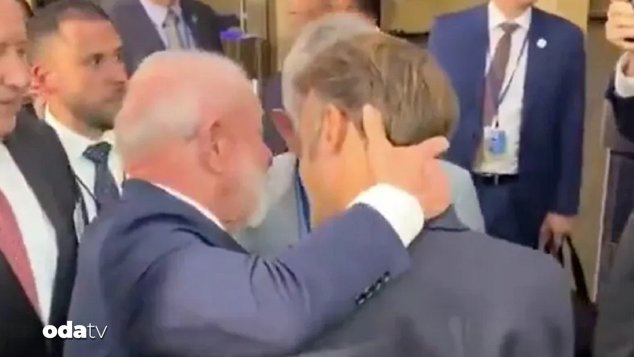 bmde tuhaf goruntu macrona el ense cekti behBFx37